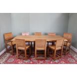 Malcolm Foxman Pipes - an adzed oak rectangular dining table, on octagonal end supports with floor