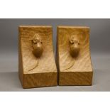 Robert Mouseman Thompson of Kilburn - a pair of oak adzed bookends, carved with signature single
