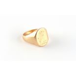 Property of a gentleman - a 9ct gold signet ring with faint engraved crest, approximately 7.1 grams,