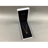 Pandora; A Circular Cluster 'Floating' Pendant, the centre claw set highlight within pavé