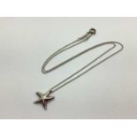 Tiffany & Co; An 'Elsa Peretti' Modern Starfish Pendant, of plain design, on a fine trace link