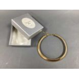 Christian Dior; A Gilt Coloured Snake Style Link Choker Necklace, of graduated design, to snap clasp