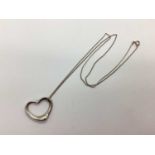 Tiffany & Co; An 'Elsa Peretti' Modern Openwork Heart Pendant, of plain design, signed "©Tiffany &