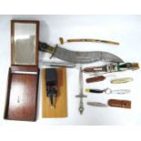 Indian Kukri Style Knife, with worked blade and horn handle, pocket and other knives. Jaguar pen,