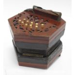 A XIX Century Lachenal Concertina, with eighteen bone keys (three missing), fretwork ends and