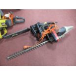 Two power tools: Spear & Jackson HTEG23-660 corded hedge trimmer and Parkside PKS40/3 chainsaw.
