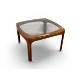 A Teak Coffee Table, circa 1970 in the manner of G Plan with rounded edge square form and a glass