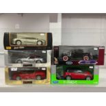 Five 1:18th scale diecast model cars by UT Models, Maisto, Welly, Yatming to include UT Models