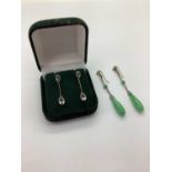 A Pair of Antique Jade Coloured Drop Earrings, to decorative hook fittings, overall length