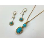 An Antique Turquoise and Seed Pearl Drop Pendant, of oval form, claw set to round cabochon set bail,