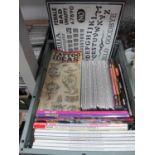 Tattoo art publications, including comprehensive reference guides such as “Tattoo Artists”, “The