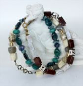 DREI ORIGINAL LANGANI HALSKETTEN. Mit