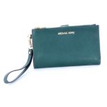 MICHAEL KORS CHLUTCH. Canvas in