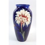 A rare William Moorcroft vase painted cornflower design on a cobalt blue ground, circa 1930, thought