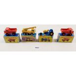 Four boxed Matchbox die cast vehicles including 63 Superfast Dodge crane truck, 39 Ford tractor