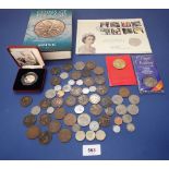 A group of coins including a silver proof four minute mile 50p coin cased, various British coins and