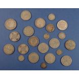 A group of .500 silver British coins to include George V and VI, half crown, florins, shillings,