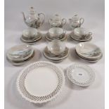 A Japanese egg shell tea service comprising four cups, eight saucers, six tea plates, teapot, milk