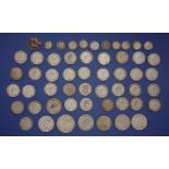 A group of .500 silver British coins including George V and VI half crowns, florins, shillings and