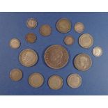 A group of silver content British coins to include George V and VI threepences, sixpences,
