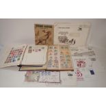 Two world stamp albums (part filled) a stock book, plus a small collection of first day covers