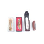 A boxed Winchester Canoe Knife, Case & Sons Sodbuster folding knife, Swiss Army Farmer knife in