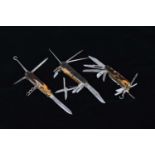 A group of three Multi-Tool pocket knives,