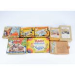 A large quantity of jigsaws,