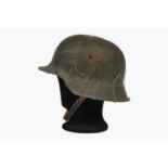 A WWII M42 Raw Edge Steel Helmet,