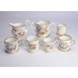 19th century English porcelain with gilded named and dated floral painted vessels,