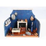 A mid 19th century small English wooden toy 'blue' kitchen,