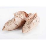 A pair of early 19th century silk baby or doll slippers,