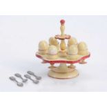 An 19th century German turned wooden dolls’ house egg stand,