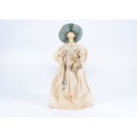 A large 19th century Grodnertal wooden doll and her doll,