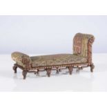 An unusual 19th century dolls’ house chaise lounge,