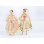 Two rare mid 19th century poured wax dolls’ house size ballet dancing dolls,