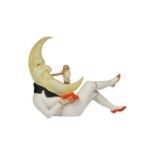 A vintage Schafer and Vater bisque moon figure,