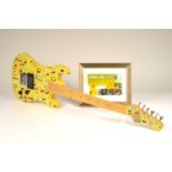 A signed SpongeBob square pants fender six string Guitar,
