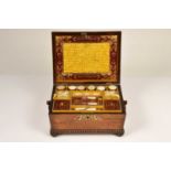 A 19th Century mahogany sarcophagus shaped workbox,