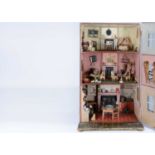 A mid 19th century English box back dolls’ house,