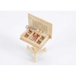 An 19th century bone dolls’ house work table,