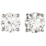 A PAIR OF DIAMOND STUD EARRINGS