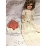 An early 20th century German Bisque head doll by A