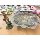 A silver plated basket (28cm wide) and a small microscope