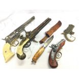 Four replica flint lock and percussion pistols and