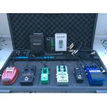 A Boss BCB-60 pedal board with various effects pedals including a Digitech Mosaic 12 string,