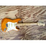 A 1993/94 USA Fender Stratocaster electric guitar. Cosmetically in good order, replacement tremolo