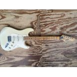 A Peavey Predator electric guitar, no case.