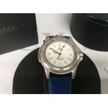 A boxed Tag Heuer WF1112-0 watch with booklets etc