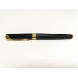 A Waterman fountain pen with an 18k gold nib.